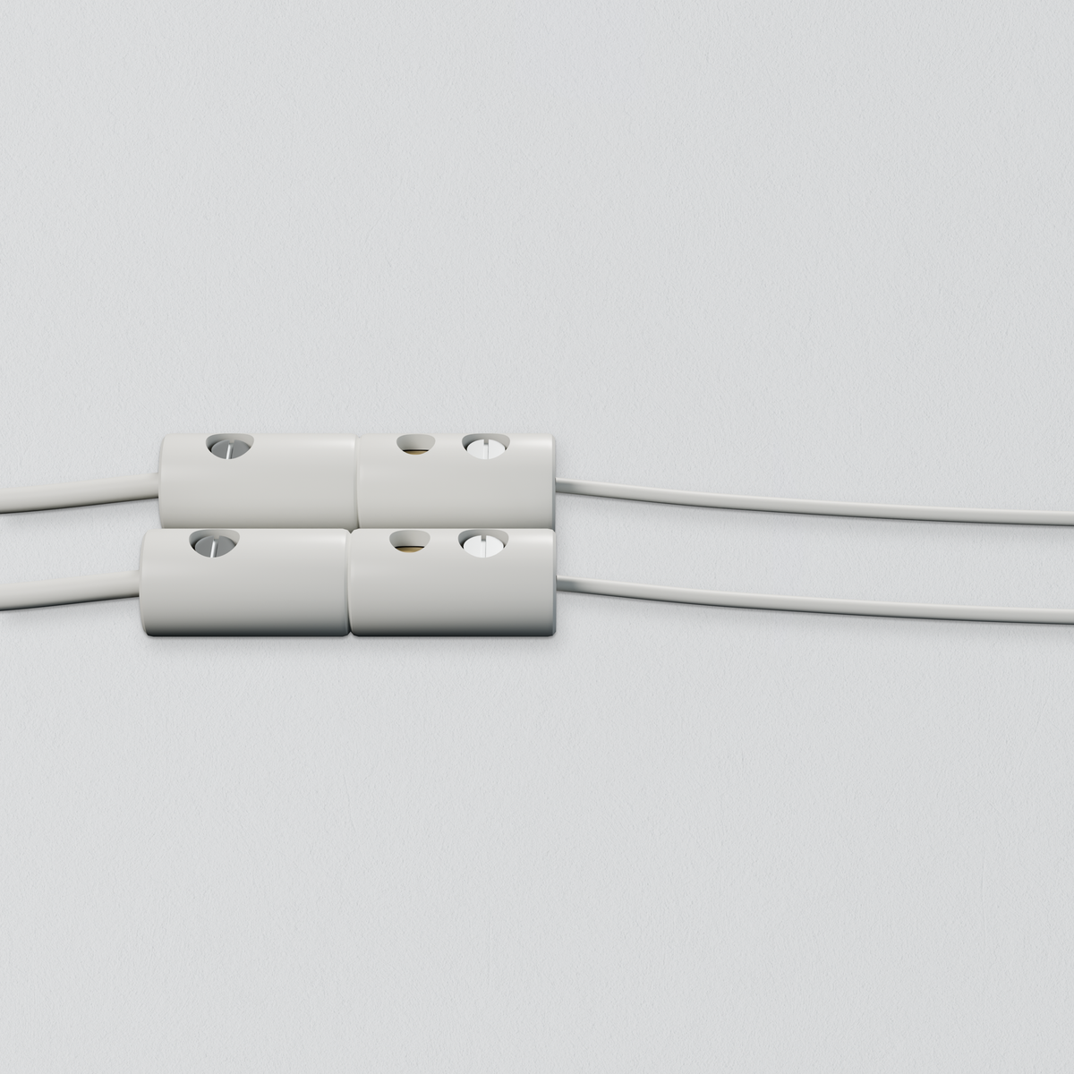 Zwei Zwergstecker in zwei Muffen gesteckt (gezeigt mit dem nächsten Kabel; Wandlerkabel und Anschlusskabel nicht im Lieferumfang)
